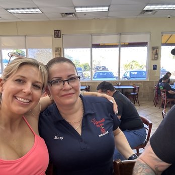 Rinconcito Rest & cafe - two women posing for a picture - Cuban Near Me - Miami, Florida