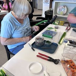 Grandma making turtles