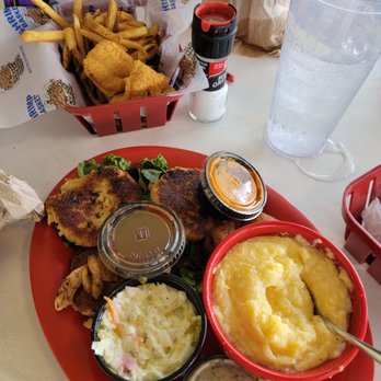Shrimp Basket - Crab cake platter with cheese grits and kids' white fish basket - Seafood Near Me - Pensacola, Florida