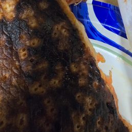 Burnt pizza that smells like charcoal Burnt pizza that smells like charcoal