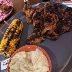 Nando's - Mashed potatoes, gravy, corn on the cob, 10 plain wings and a side of fork! - well done not burned that's how in order them