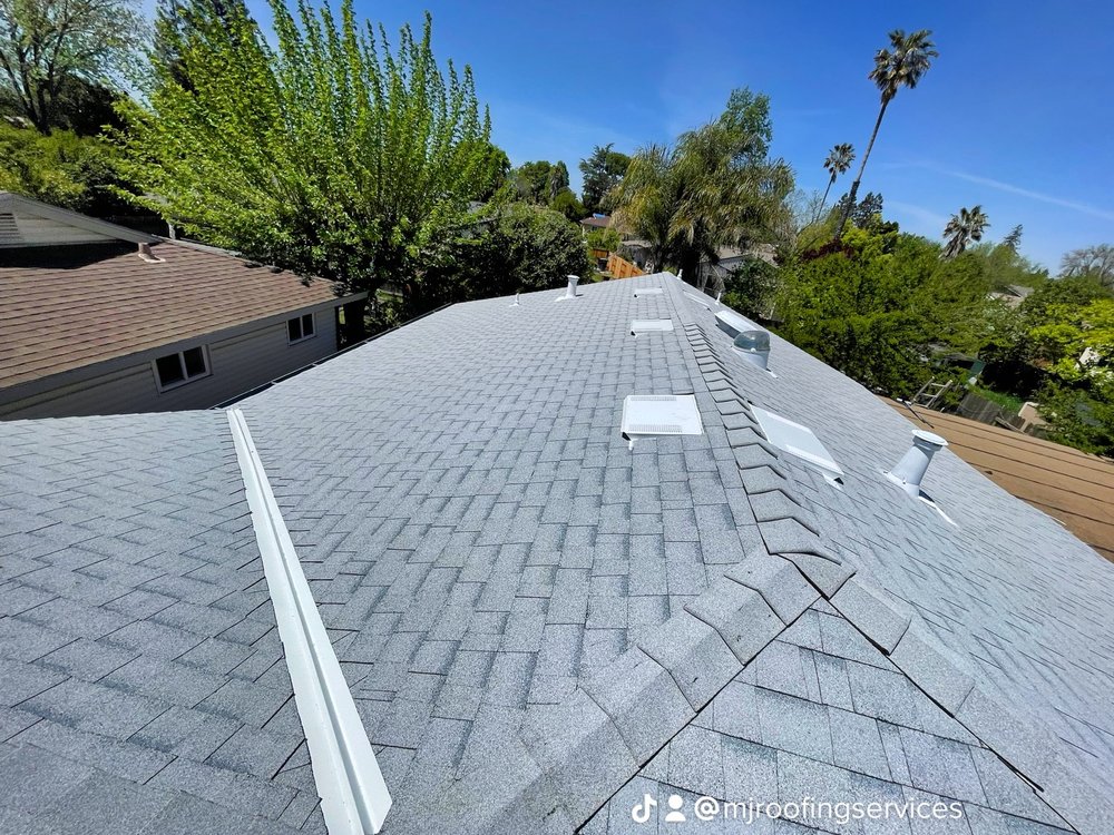 Slide of MJ Roofing Services