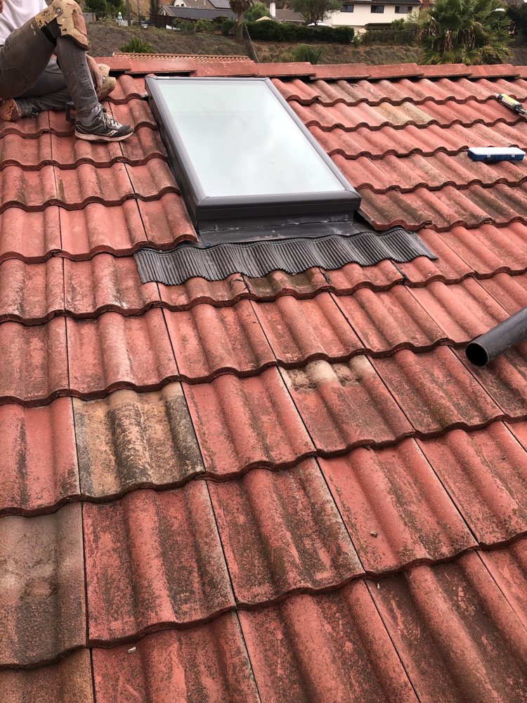 Slide of Tello's Roofing