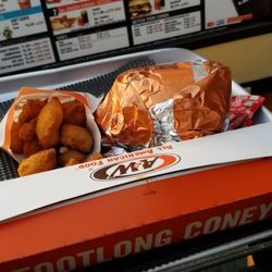 A&W Restaurant - Papa Burger w/onion rings Foot Ling Coney w/ onion rings Cheese Curds DELICIOUS!!!