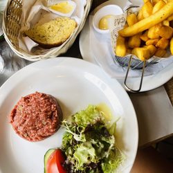 La Rose Blanche - The best bread   Beef tartare with fries was delicious!