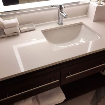 Home2 Suites by Hilton Covington - Spacious bathroom sink with plenty of counter space. - Hotels Near Me - Covington, Georgia Home2 Suites by Hilton Covington - Spacious bathroom sink with plenty of counter space. - Hotels Near Me - Covington, Georgia