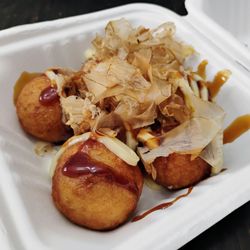 Umi Eatery - Takoyaki (hold the sesame seeds). 6 pieces for $6.99.