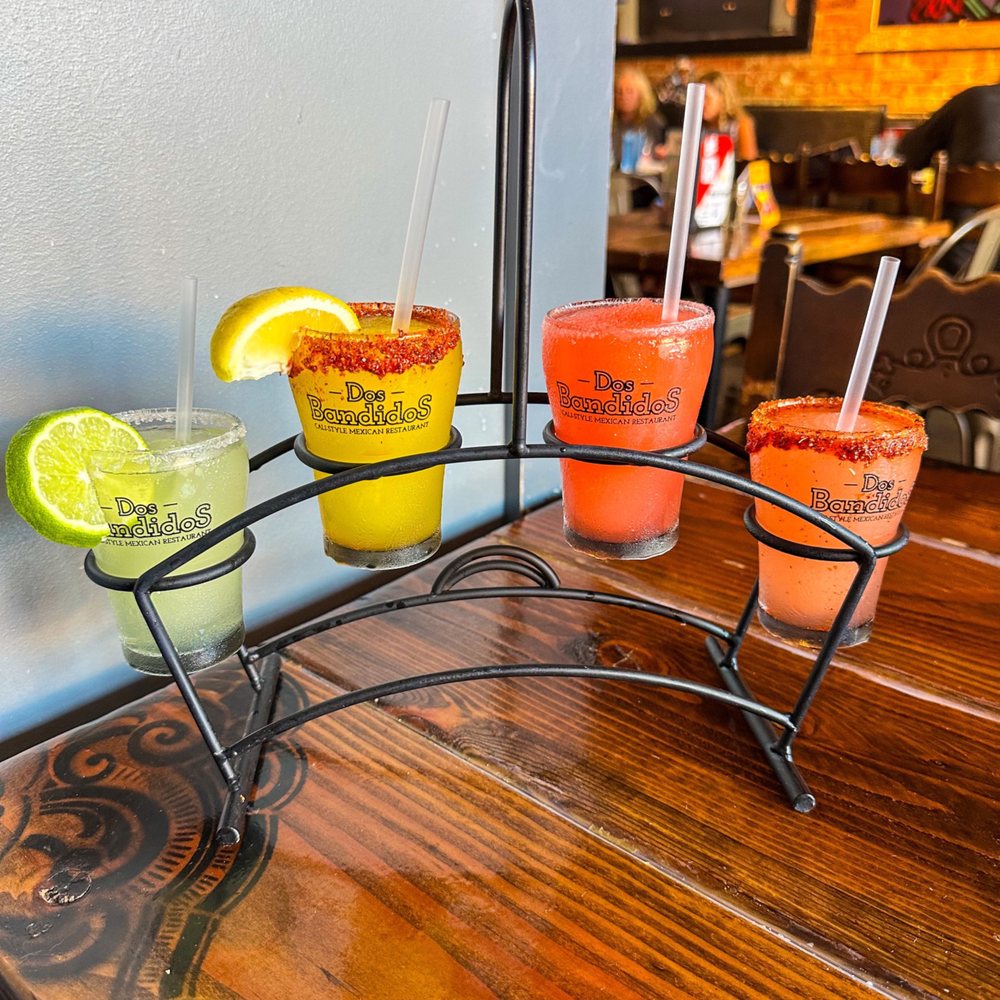 Dos Bandidos - a row of drinks on a table - Mexican Near Me - Broken Arrow, Oklahoma Dos Bandidos - a row of drinks on a table - Mexican Near Me - Broken Arrow, Oklahoma