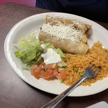 Toma Taco - Chicken Flauta and rice - Tacos Near Me - San Marcos, Texas Toma Taco - Chicken Flauta and rice - Tacos Near Me - San Marcos, Texas