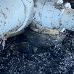 Twin Lakes RV Park - This sewer connection is not even hooked up and the sewage just dumps right onto the ground