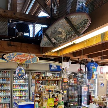 Boccato's Groceries - Hermosaics surfboards on display - Grocery Near Me - Hermosa Beach, California