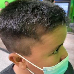 The choppy haircut the balding gentleman gave my son. The choppy haircut the balding gentleman gave my son.