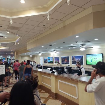 Tropicana Laughlin - A Caesars Rewards Destination - 4 people working counter.   Please step your game - Hotels Near Me - Laughlin, Nevada