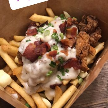 The Kroft - Chicken fried steak fries comes with gravy, cheese curds, bacon, chicken nuggets, and green onion over fries - Sandwiches Near Me - Anaheim, California The Kroft - Chicken fried steak fries comes with gravy, cheese curds, bacon, chicken nuggets, and green onion over fries - Sandwiches Near Me - Anaheim, California