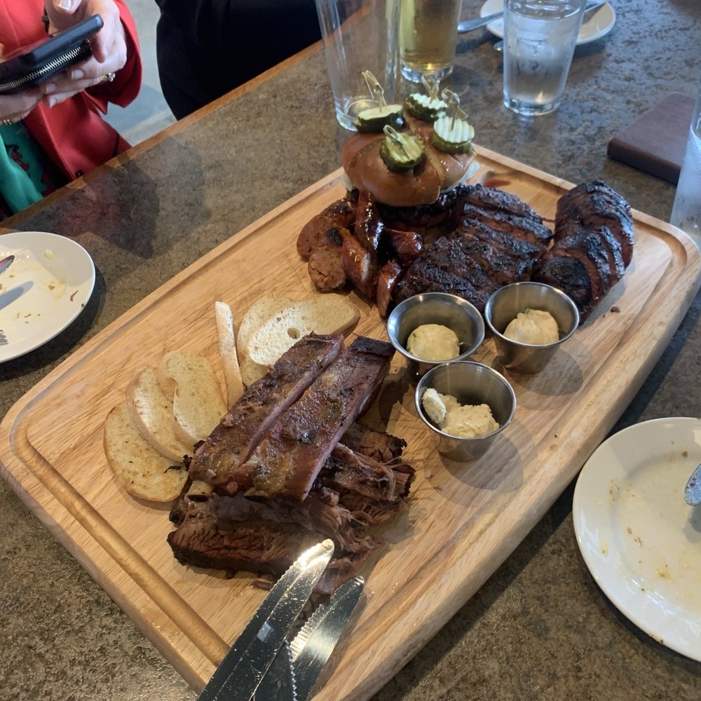 Platter with ribs, steak, sausage, and pork Platter with ribs, steak, sausage, and pork