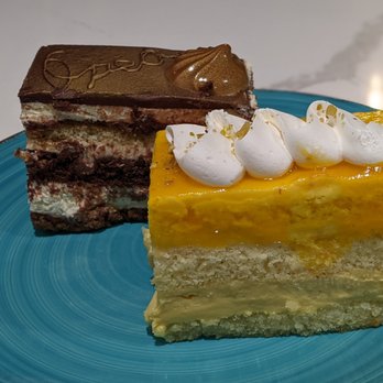 The Oasis Cafe - Oreo cake in back (with gold dust), Pretty n sooo good. Mango cake in front (not bad either) - Cafes Near Me - Flushing, New York The Oasis Cafe - Oreo cake in back (with gold dust), Pretty n sooo good. Mango cake in front (not bad either) - Cafes Near Me - Flushing, New York
