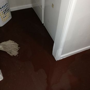 Champion Plumbing - Water heater leaked under the walls into the laundry room - Plumbing Near Me - Yukon, Oklahoma Champion Plumbing - Water heater leaked under the walls into the laundry room - Plumbing Near Me - Yukon, Oklahoma