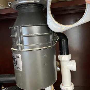 Anytime Construction Services - Improper garbage disposal installed and didn't use plumbing putty so it leaks. 3 guys put this together and still didn't get it right. - Handyman Near Me - Gatesville, Texas