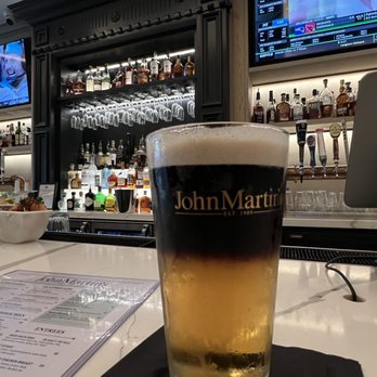 John Martin's - Half & half (Guinness & Harp) from my bar seat POV. - Irish Near Me - Miami, Florida John Martin's - Half & half (Guinness & Harp) from my bar seat POV. - Irish Near Me - Miami, Florida