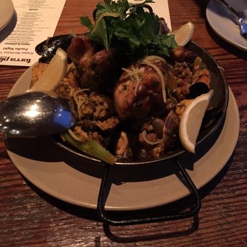 Terra Plata - Paella Mixto- chicken, chorizo, clams, mussels, prawns, sofritos, saffron rice. - New American Near Me - Seattle, Washington