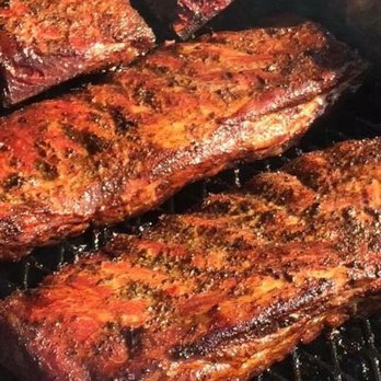 Houndstooth Barbeque - ribs cooking on a grill - Food Trucks Near Me - Duncanville, Alabama Houndstooth Barbeque - ribs cooking on a grill - Food Trucks Near Me - Duncanville, Alabama