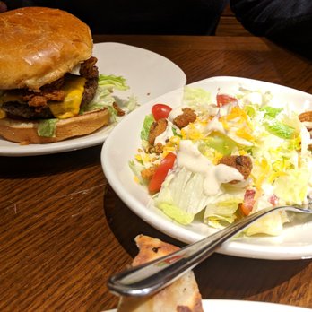 Outback Steakhouse - Grass fed blooming burger with house salad. - Steakhouses Near Me - Colonie, New York