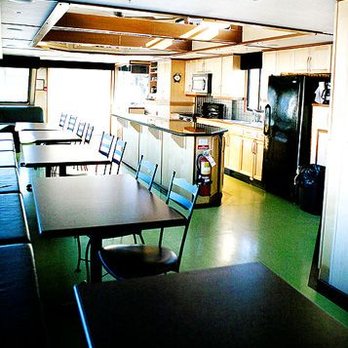 Kelowna Cruises - The dining area on The Lake Lounge on Okanagan. - Lounges Near Me - Kelowna, British Columbia Kelowna Cruises - The dining area on The Lake Lounge on Okanagan. - Lounges Near Me - Kelowna, British Columbia
