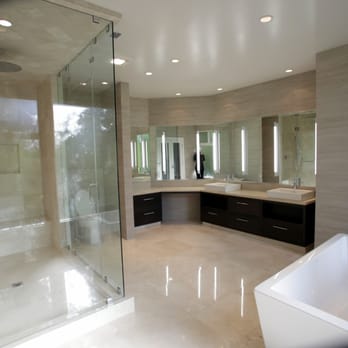 T&E Group - a large bathroom with a walk in shower - General Contractors Near Me T&E Group - a large bathroom with a walk in shower - General Contractors Near Me