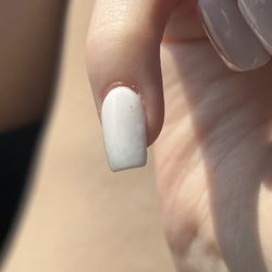 Gloss Nail Studio - left black speck on nail