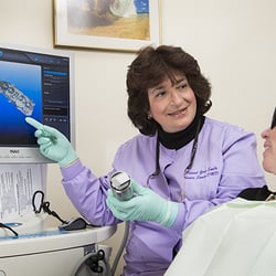 Janice E Spada, DMD - ITero scanner captures impresssions digitally. Used for crowns, veneers, and Invisalign