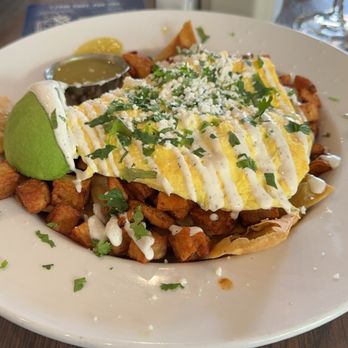 Hash Kitchen - CHILAQUILES and a passion fruit mimosa (not pictured) - Breakfast & Brunch Near Me - Peoria, Arizona Hash Kitchen - CHILAQUILES and a passion fruit mimosa (not pictured) - Breakfast & Brunch Near Me - Peoria, Arizona