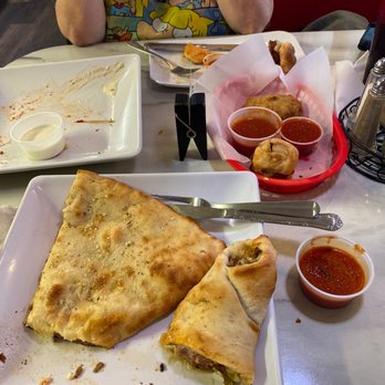 Super Sardo's Pizza - Stuffed slice and a sausage roll. - Pizza Near Me - Largo, Florida Super Sardo's Pizza - Stuffed slice and a sausage roll. - Pizza Near Me - Largo, Florida
