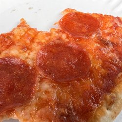 Fregene's Pizza - The pizza is so good I barely had time to take a picture of it
