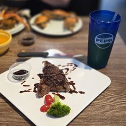 Umi Sushi & Seafood Buffet - Brandon - We visited on 04-02 and they were offering a special deal if you 'checked in' you were given a very nice piece of steak!