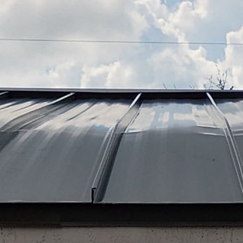 Guardian Impact Windows & Roofing - Metal roof with dents and creases - Roofing Near Me - Deerfield Beach, Florida