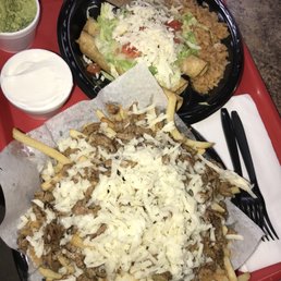 Carne asada fries and potato roll tacos with rice and beans Carne asada fries and potato roll tacos with rice and beans