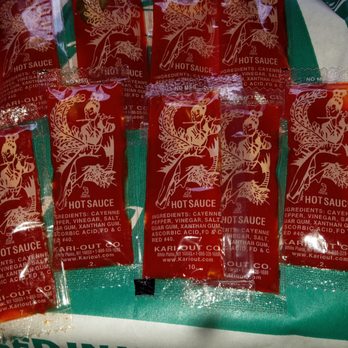 St Louis Fish & Chicken - 9 Chinese hot sauce packets that came with my order. - Seafood Near Me - Bridgeton, Missouri