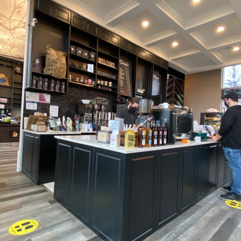 a man standing at the counter a man standing at the counter