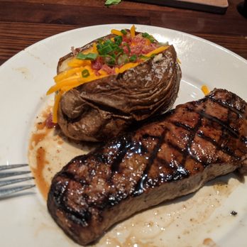 LongHorn Steakhouse - New York Strip with loaded baked potato side - Steakhouses Near Me - Centennial, Colorado
