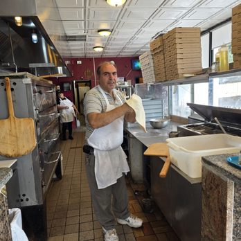 Tony Avellino's - The owner and chef of Tony Avellino's Italian Eatery making one of his pizza creations. - Italian Near Me - Roanoke, Virginia Tony Avellino's - The owner and chef of Tony Avellino's Italian Eatery making one of his pizza creations. - Italian Near Me - Roanoke, Virginia