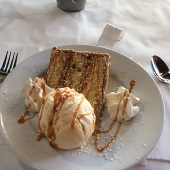 Lemon Leaf Cafe - Orange cake with ice cream. Great presentation but rather dry. - Bakeries Near Me - Palmdale, California Lemon Leaf Cafe - Orange cake with ice cream. Great presentation but rather dry. - Bakeries Near Me - Palmdale, California