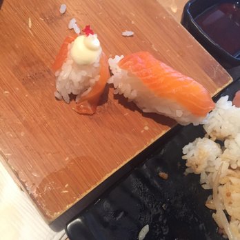 Fisshu - 1X salmon rose (yes, one slice of salmon makes a rose!) and 1x salmon nigiri - Asian Fusion Near Me - Montreal, Quebec Fisshu - 1X salmon rose (yes, one slice of salmon makes a rose!) and 1x salmon nigiri - Asian Fusion Near Me - Montreal, Quebec