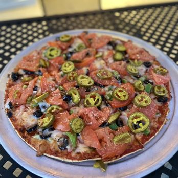 Imo’s Pizza - a pizza on a plate - Pizza Near Me - Wentzville, Missouri Imo’s Pizza - a pizza on a plate - Pizza Near Me - Wentzville, Missouri