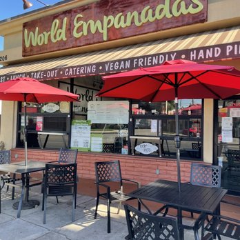 World Empanadas - tables and umbrellas outside - Latin American Near Me - Burbank, California World Empanadas - tables and umbrellas outside - Latin American Near Me - Burbank, California