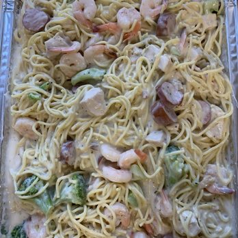 Creative Soul Food Kitchen - a pan of pasta with shrimp and broccoli - Personal Chefs Near Me Creative Soul Food Kitchen - a pan of pasta with shrimp and broccoli - Personal Chefs Near Me
