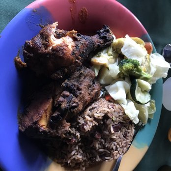 Reggae Hut - Jerk chicken, rice with beans, and cabbage with vegetables - Caribbean Near Me - Houston, Texas Reggae Hut - Jerk chicken, rice with beans, and cabbage with vegetables - Caribbean Near Me - Houston, Texas