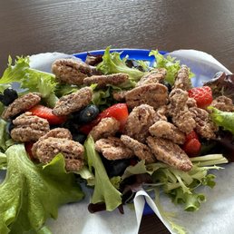 Salad with strawberries, blueberries and candied pecans Salad with strawberries, blueberries and candied pecans