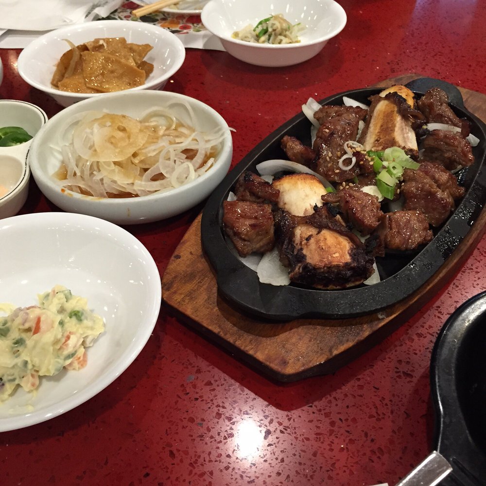 Mapo BBQ - $38 for this kalbi with11 pieces of beef cubes. $3 per cube. They filled the plate with 2 large pieces of bones. Beef was good. - Korean Near Me - Flushing, New York