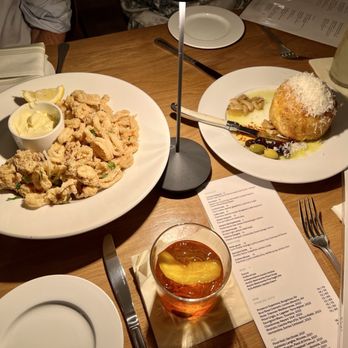 La Traviata Italian Kitchen - Fried Calamari and Warm Rosemary Focaccia - Italian Near Me - Austin, Texas La Traviata Italian Kitchen - Fried Calamari and Warm Rosemary Focaccia - Italian Near Me - Austin, Texas