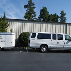 Red Tie Transit - 14 Passenger Van with Trailer, perfect for golf clubs and luggage for your golf group.